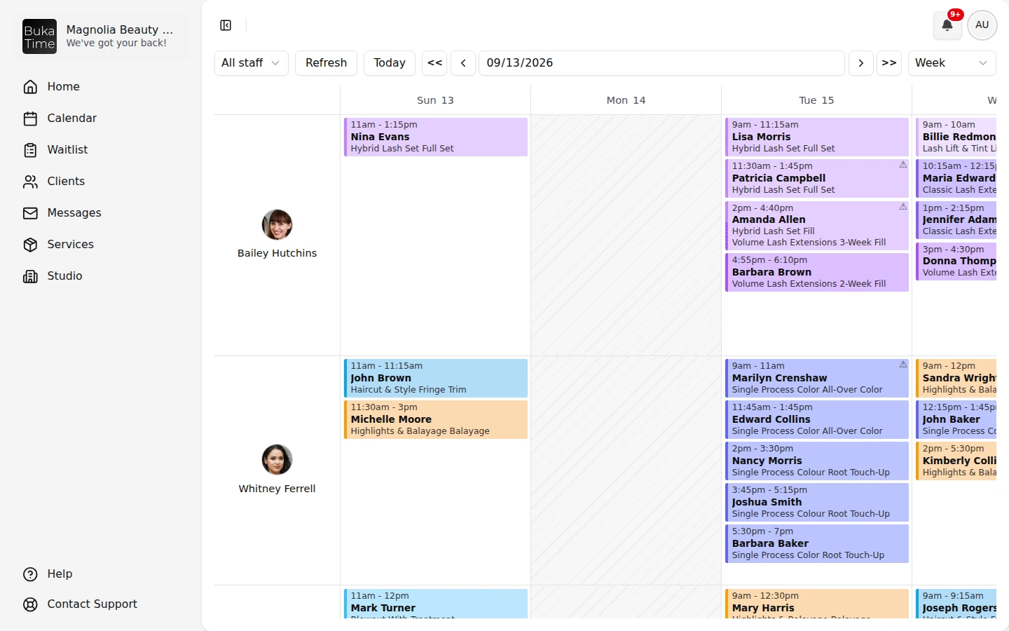 The BukaTime calendar on a busy day: every stylist with a column of booked appointments.